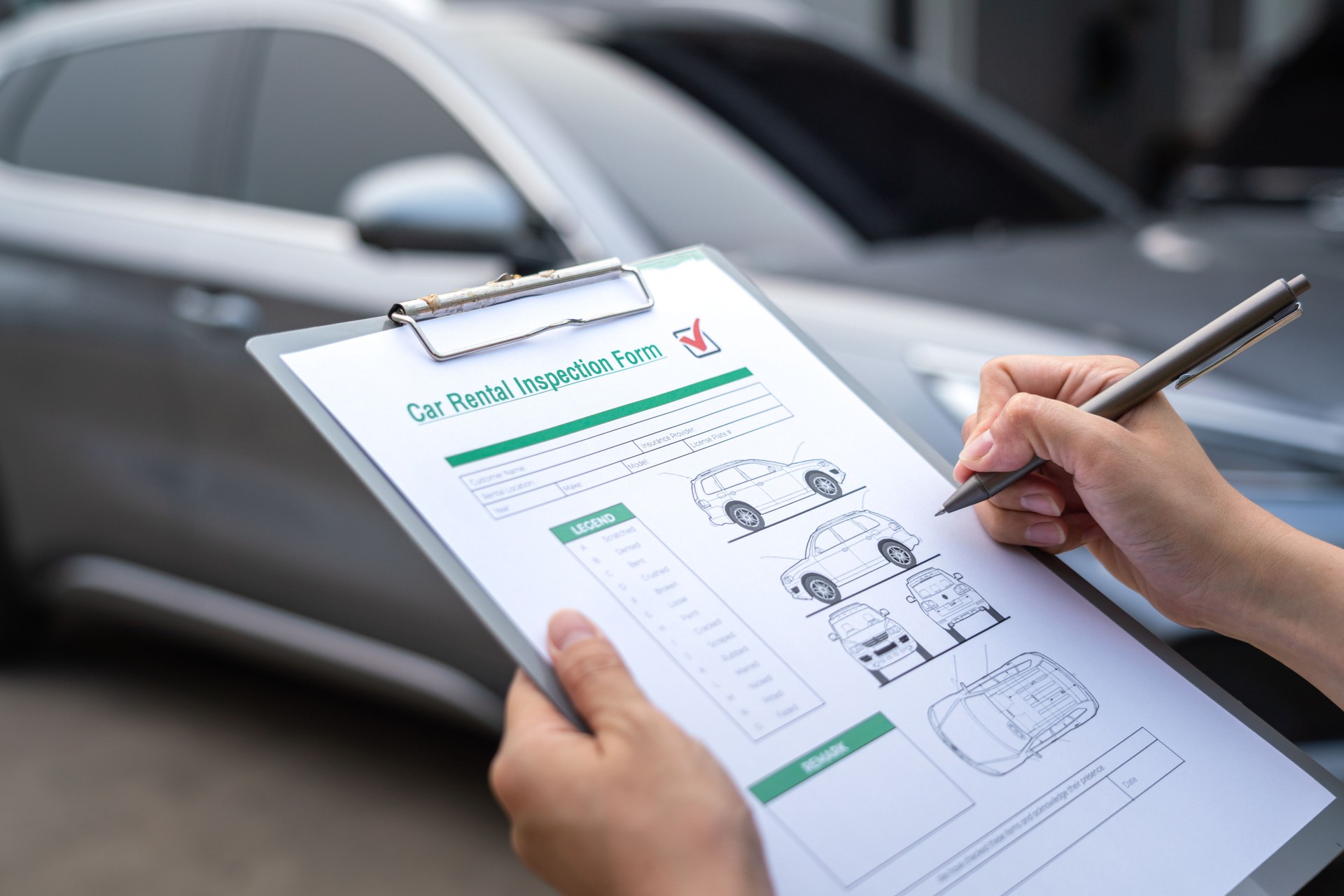 Car rental agreement signing.